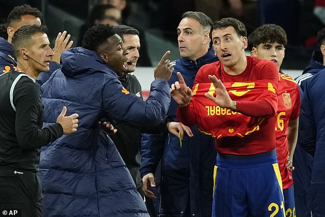 The tackle on Cucurella sparked a touchline row involving Brazilian star Vinicius Jnr, with Spain's Mikel Oyarzabal appearing to attempt to calm him down