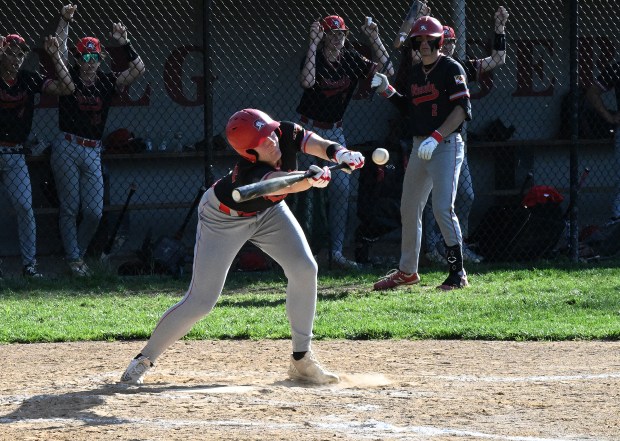 Glenelg #22, Ty Whittaker lays down a bunt for a...