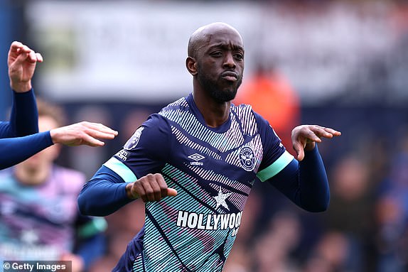 LUTON, ENGLAND - APRIL 20: Yoane Wissa of Brentford celebrates scoring his team's first goal during the Premier League match between Luton Town and Brentford FC at Kenilworth Road on April 20, 2024 in Luton, England. (Photo by Richard Pelham/Getty Images)