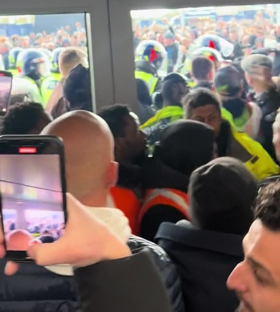 Another video showed more fans clashing with police