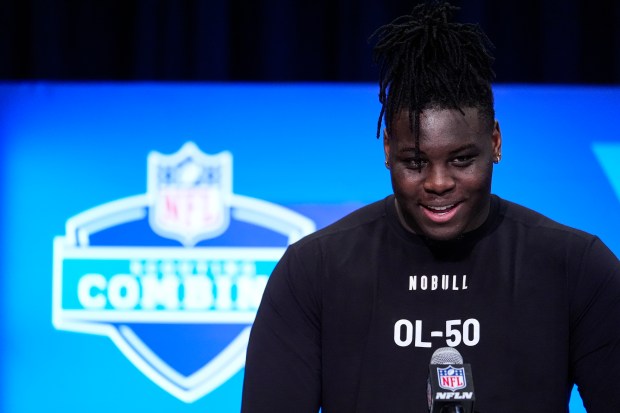 Georgia offensive lineman Amarius Mims speaks during a press conference at the NFL football scouting combine in Indianapolis, Saturday, March 2, 2024. (AP Photo/Michael Conroy)