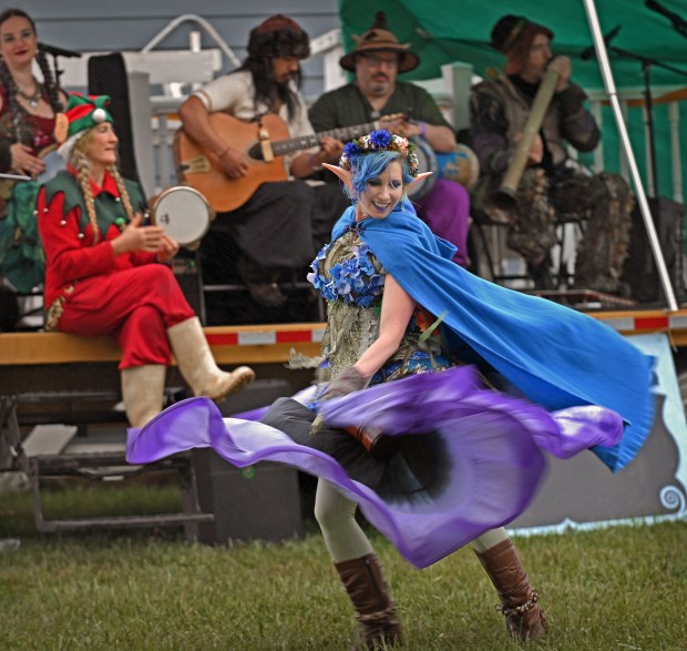 Leigh Targaryen belly dances as an Aubergine Fairy with the band Brinjal during Spoutwood Farm's May Day Faerie Festival at Rocky Point Park. (Kenneth K. Lam/Staff)