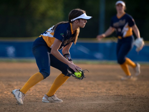 Perry Hall shortstop Madison Carl fields a grounder against Eleanor...