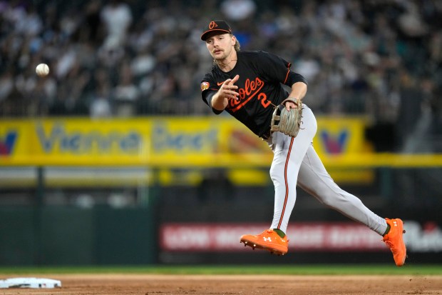 Baltimore Orioles' Gunnar Henderson throws out Chicago White Sox's Andrew...