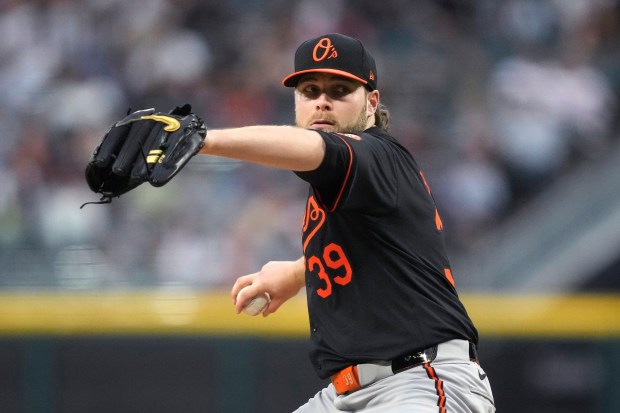 Baltimore Orioles starting pitcher Corbin Burnes delivers during the first...