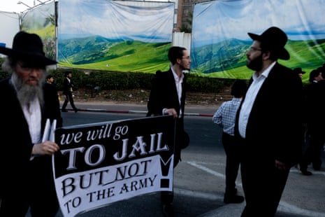 Ultra-Orthodox Jewish men protest during a demonstration against drafting into the Israeli army on Thursday in Bnei Brak, Israel.
