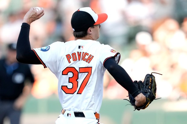 Cade Povich #37 of the Baltimore Orioles pitches in the...