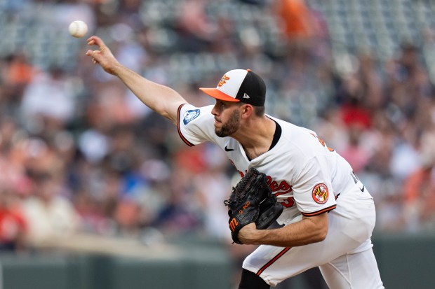 Baltimore Orioles starting pitcher Grayson Rodriguez delivers during the fourth...