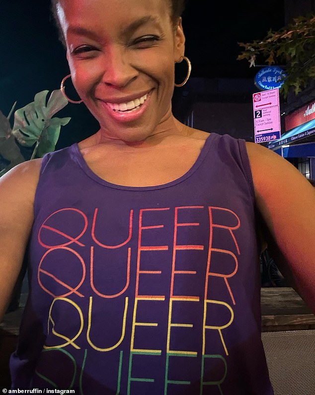 Amber Ruffin posted a picture of herself in a tank top baring the word 'Queer' in rainbow colors