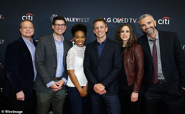 A comedian, writer, and former late-night host has come out as gay on the final day of Pride month. Pictured, writers Sal Gentile, Amber Ruffin, Jenny Hagel and Alex Baze with Seth Meyers