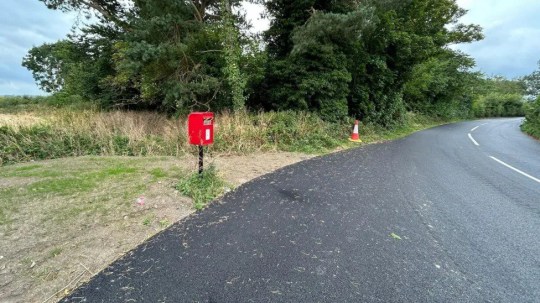 A postbox has been closed because snails have been crawling inside and munching the mail