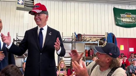 Joe Biden dons Trump hat in show of unity at event commemorating 9/11 – video