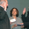 Harris takes the oath of office as San Francisco's district attorney on Jan. 8, 2004. Her mother, Dr. Shyamala Gopalan, holds a copy of the Bill of Rights.