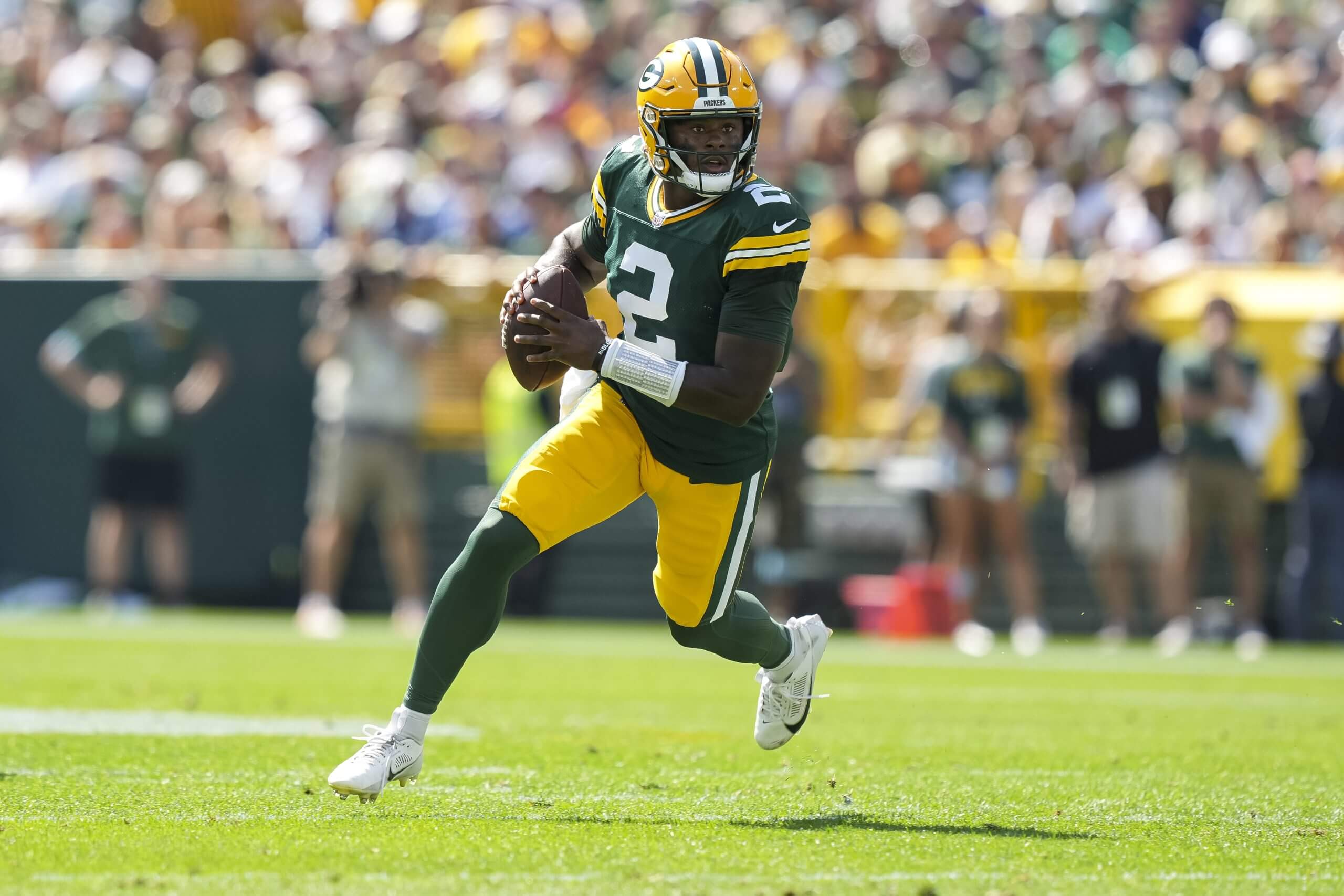 Quarterback Malik Willis of the Green Bay Packers scrambles during the second quarter of an NFL football game against the Indianapolis Colts, at Lambeau Field on September 15, 2024 in Green Bay, Wisconsin.