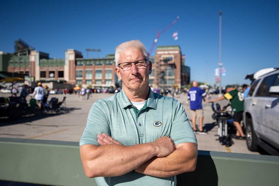 Wisconsin Assembly candidate Patrick Buckley stands outside Lambeau Field as fans tailgate Sunday, Sept. 29, 2024, in Green Bay, Wis.