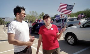 Reporter Oliver Laughland speaks to a Trump supporter at an event in Southern Arizona