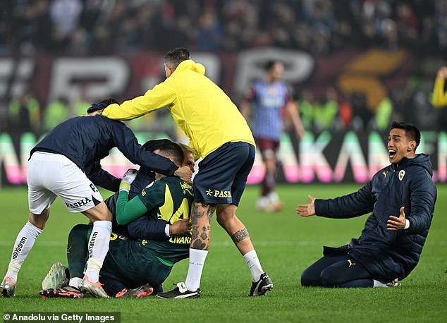 Mourinho fell forwards celebrating a 102nd-minute goal in his side's 3-2 win at Trabzonspor