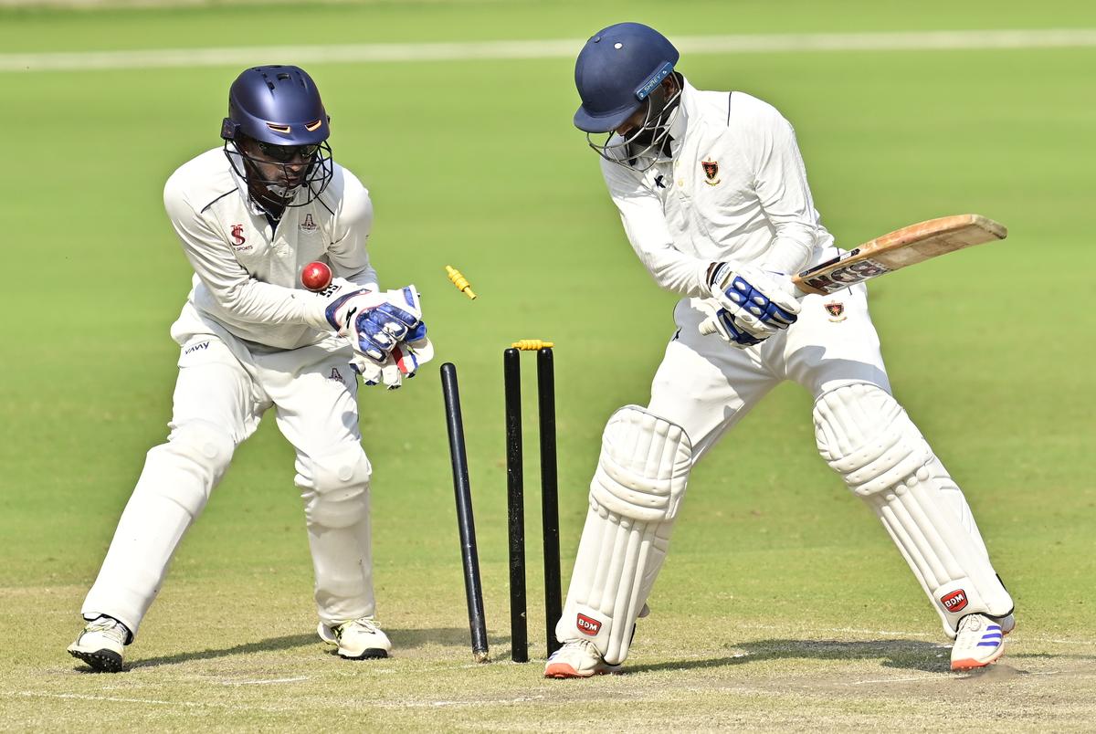 Railways’ Suraj Ahuja is bowled by Tamil Nadu’s Lakshay Jain on the day-3 of the Ranji Trophy 2024-25 match between Railways and Tamil Nadu, at the Narendra Modi Stadium, in Ahmedabad on November 15, 2024.  