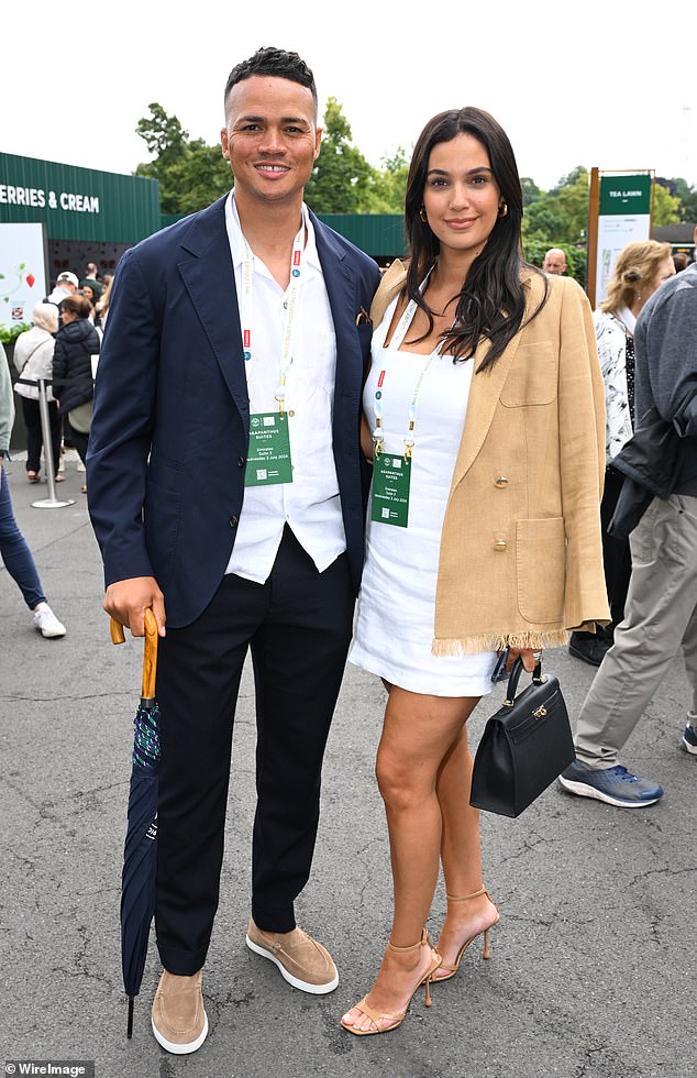 The One Show host, pictured at Wimbledon this year with wife Ellie Penfold, who has admitted the past few months have been 'incredibly difficult' after her husband was sacked by the BBC